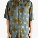 Navy shirt worn by a person, showing the shirt's fit