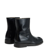 Black boot, back view