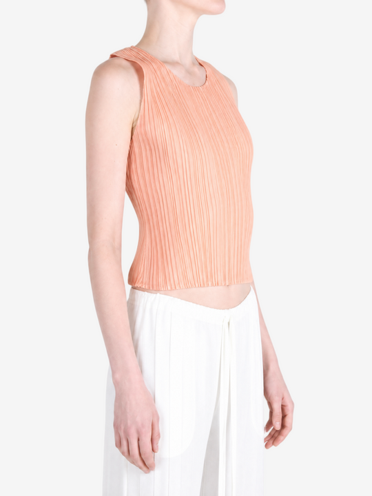 Orange shirt worn by a person, showing the shirt fit