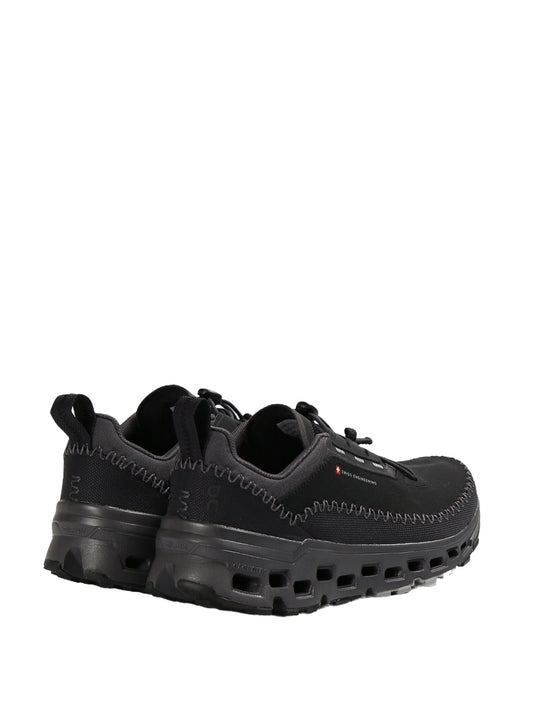 Black sneakers, back view