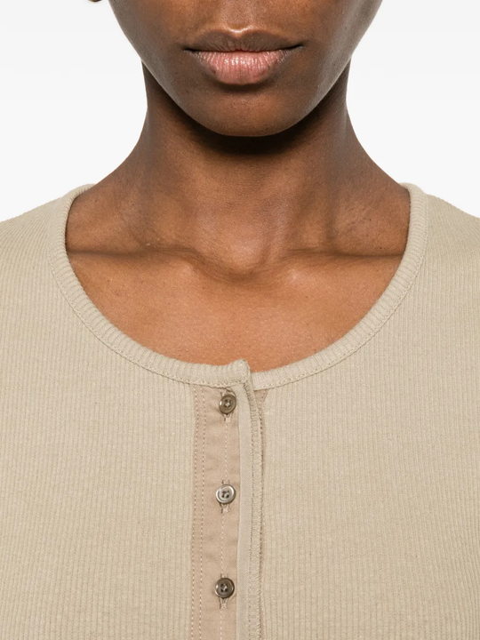 Close up of tan shirt, showing texture of the Cotton and  Linen fabric