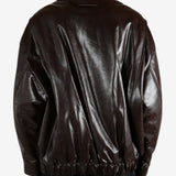 Brown jacket worn by a person, showing the jacket fit