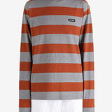Grey t-shirt worn by a person, showing the t-shirt fit