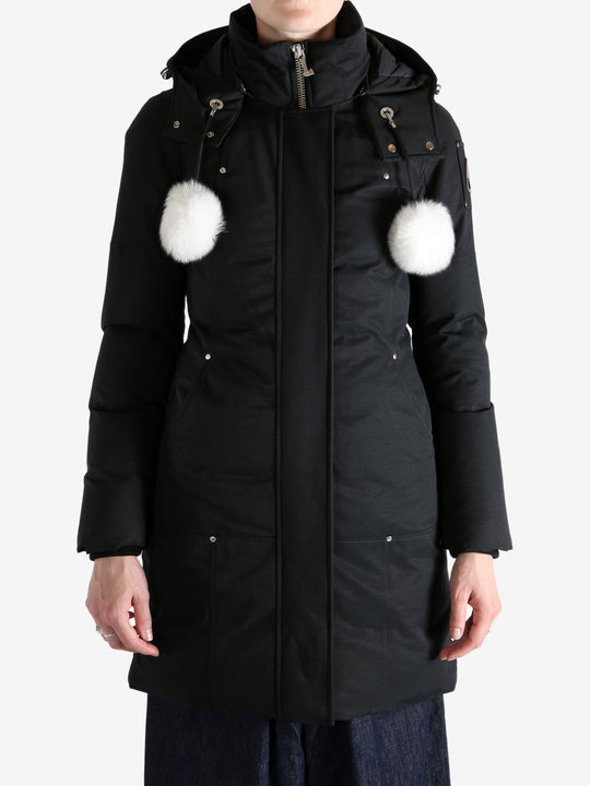 Black jacket worn by a person, showing the jacket fit