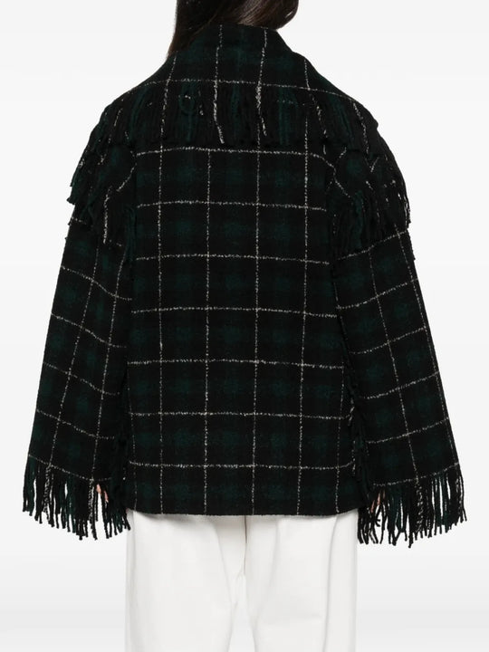 Black jacket worn by a person, showing the jacket fit