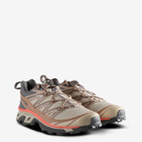 Tan sneakers, side view