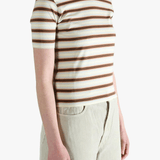 Brown t-shirt worn by a person, showing the t-shirt's fit