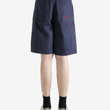 Navy shorts worn by a person, showing the shorts fit