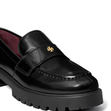 Close up of black shoes, showing texture of the leather fabric