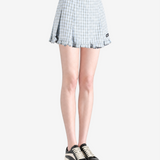 Blue skirt worn by a person, showing the skirt fit