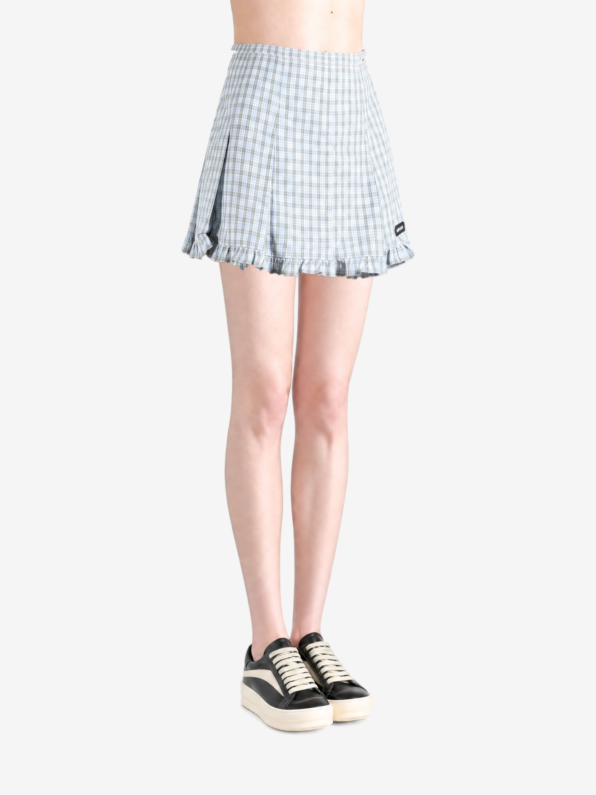 Blue skirt worn by a person, showing the skirt fit