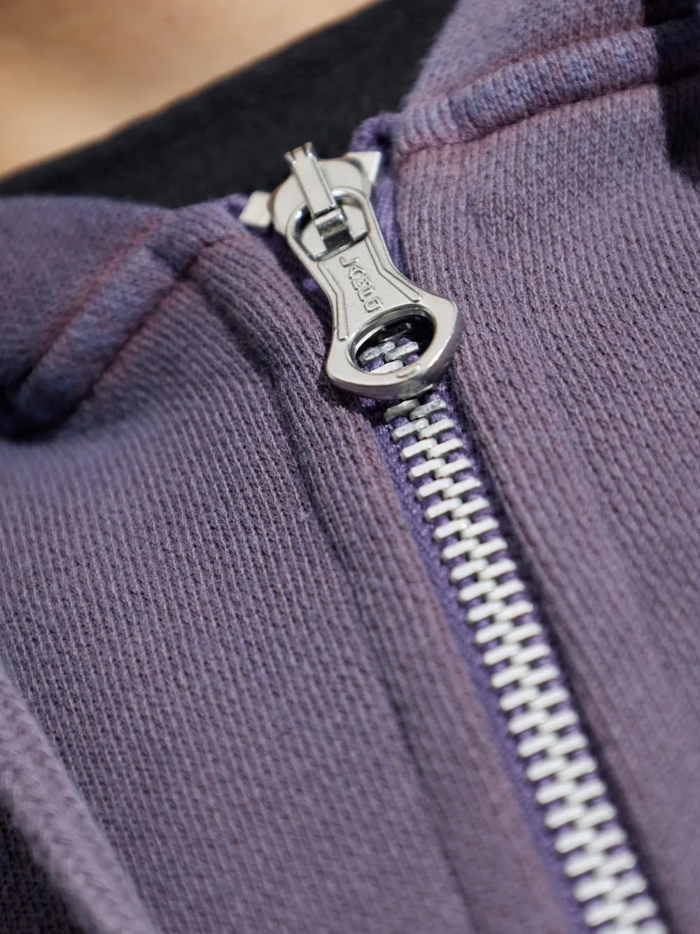 Close up of  purple hoodie ,showing texture of the cotton