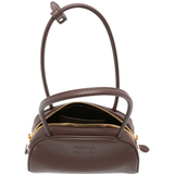 Close up of brown bag, showing texture of the calf leather fabric