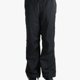 Black pants  worn by a person, showing the pants fit