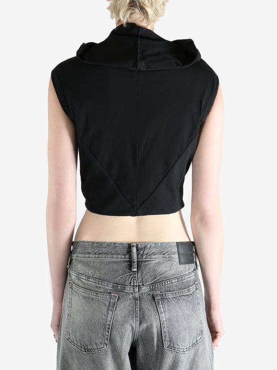 black sleeveless top worn by a person, showing the top fit