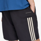 Black shorts worn by a person, showing the shorts' fit