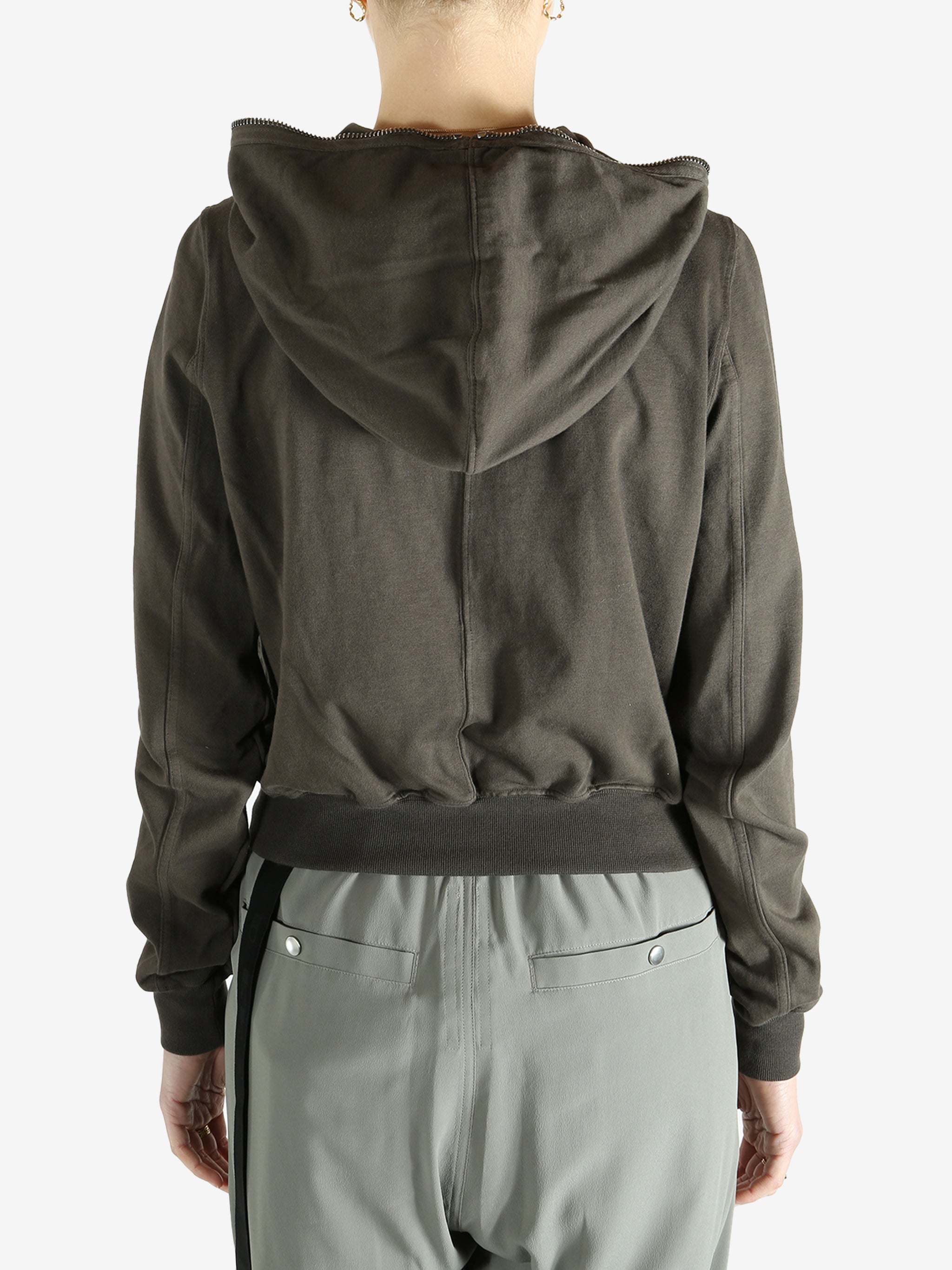 Grey weats-hoodies worn by a person, showing the sweats-hoodies fit