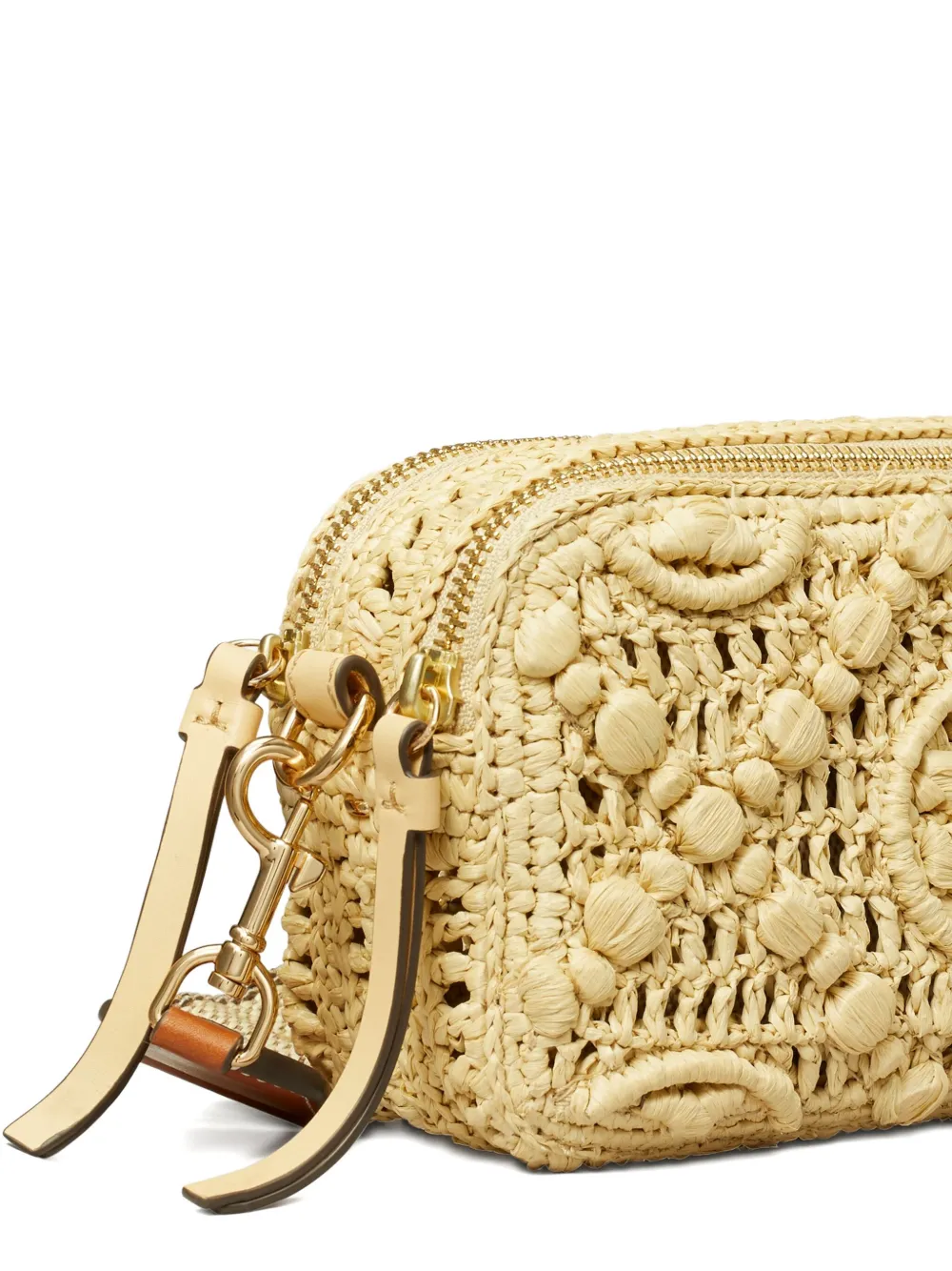 close up of tan bags, showing texture of the raffia fabric