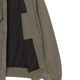 Close up of Green jacket, showing texture of the cotton fabric