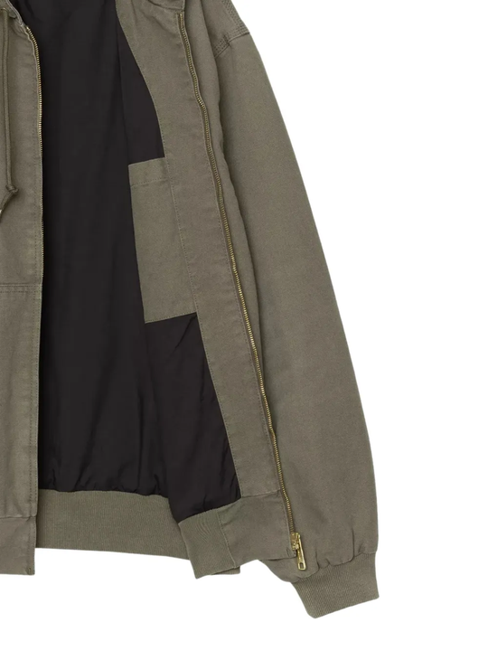 Close up of Green jacket, showing texture of the cotton fabric