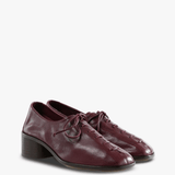 Burgundy shoes, front view