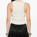 White top worn by a person, showing the top's fit