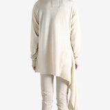 White top worn by a person, showing the top's fit