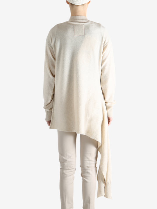 White top worn by a person, showing the top's fit