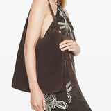 brown bags worn by a person, showing the bags fit