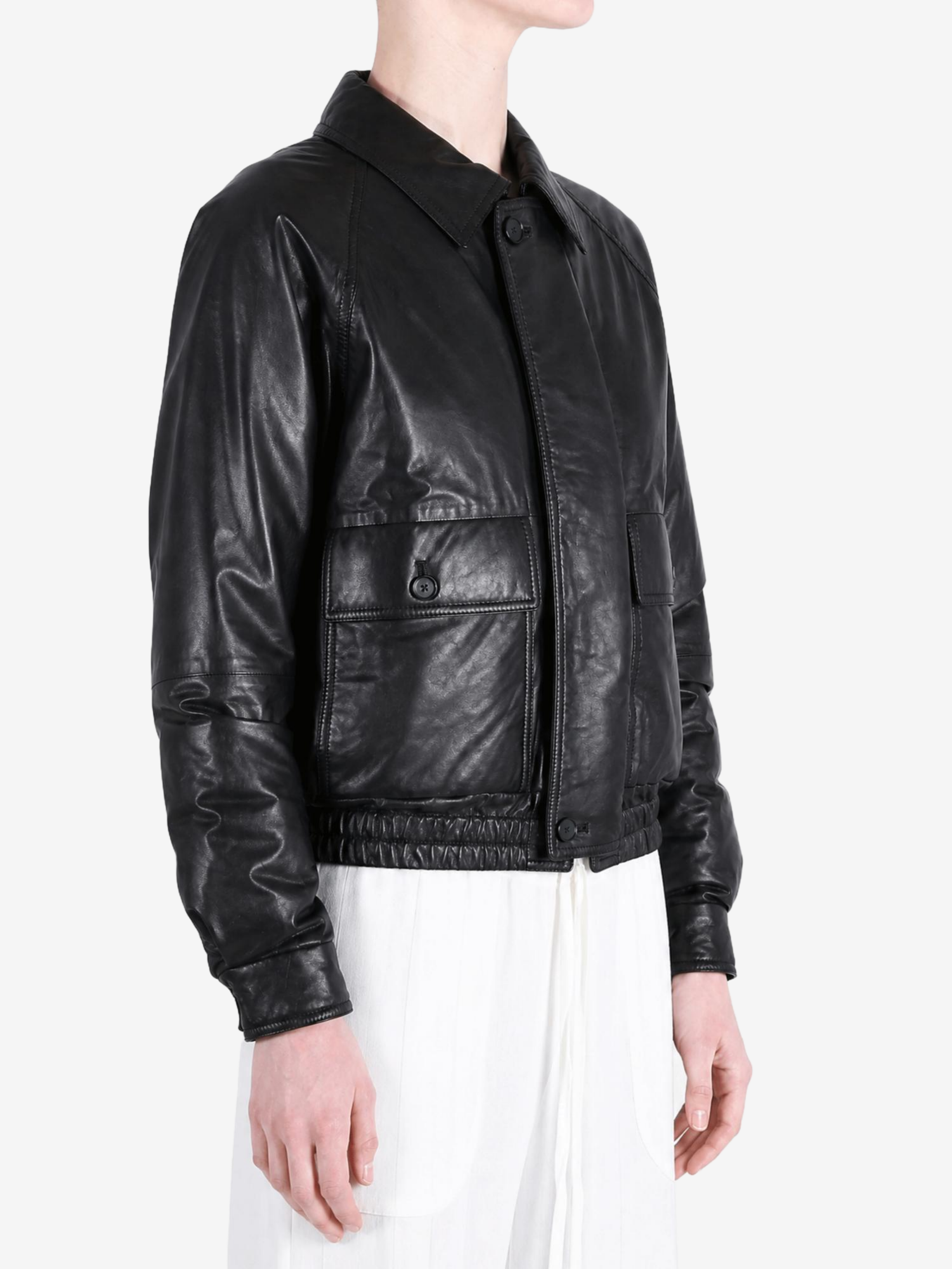 Black jacket worn by a person, showing the jacket fit