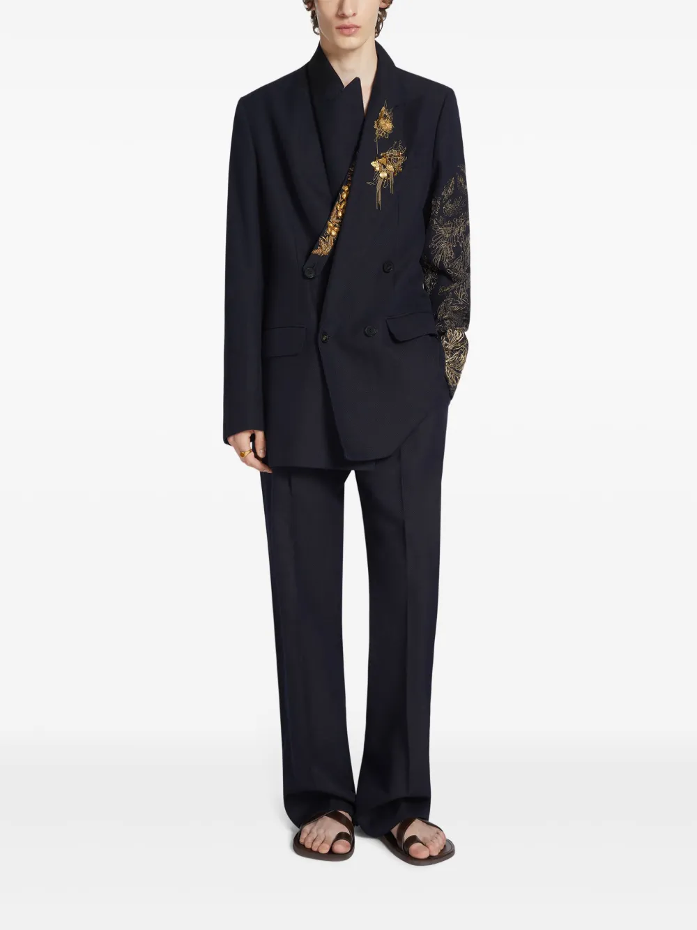 Navy jacket worn by a person, showing the  jacket's fit