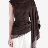 Brown top worn by a person, showing the top fit