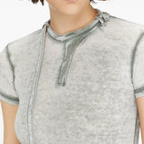 Cloes-up of grey top, showing texture of the cotton fabric