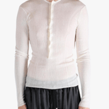 White top worn by a person, showing the top fit