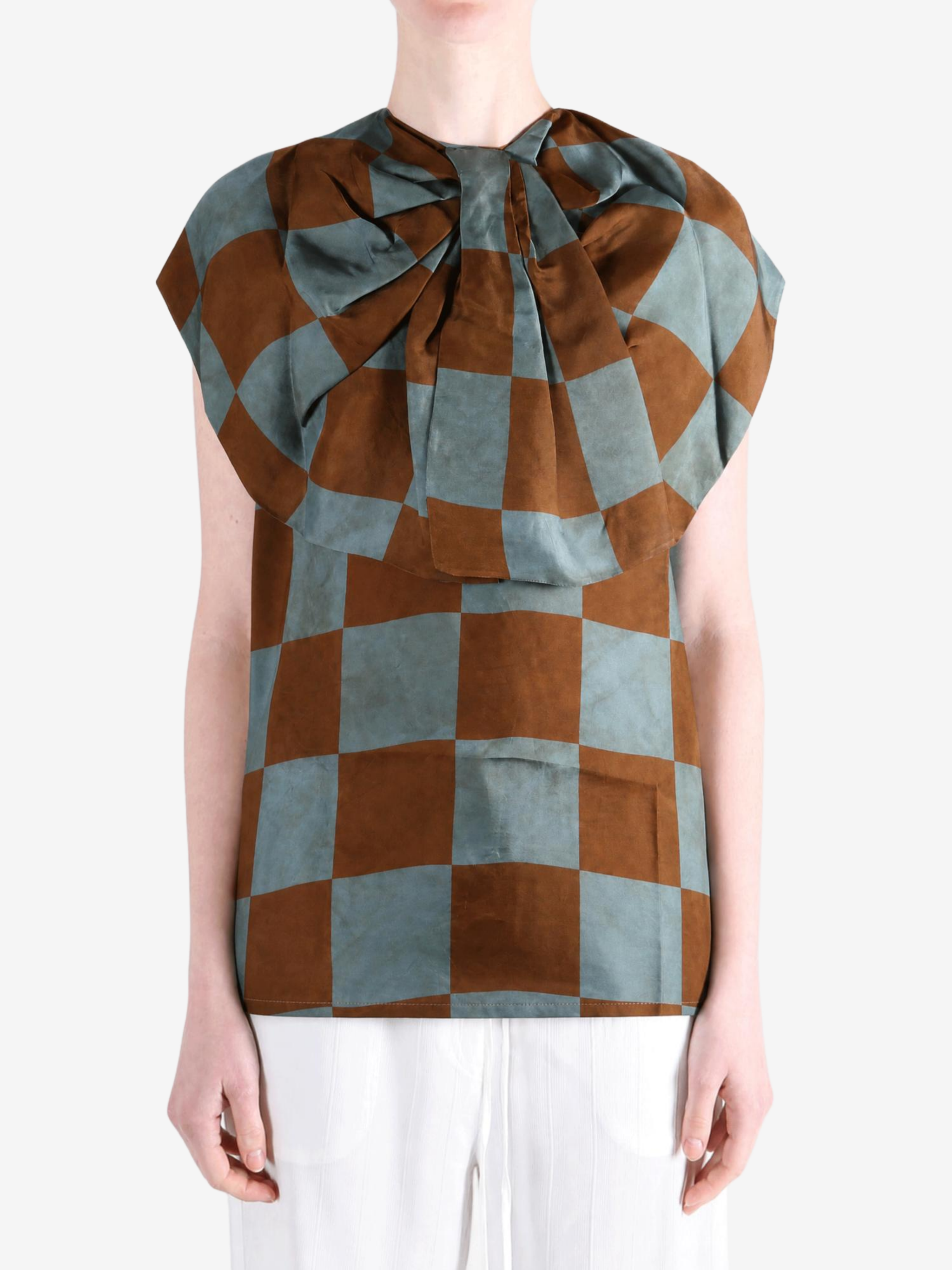 Brown top worn by a person, showing the top fit