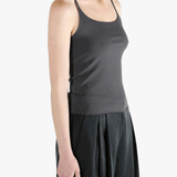Grey top worn by a person, showing the top fit