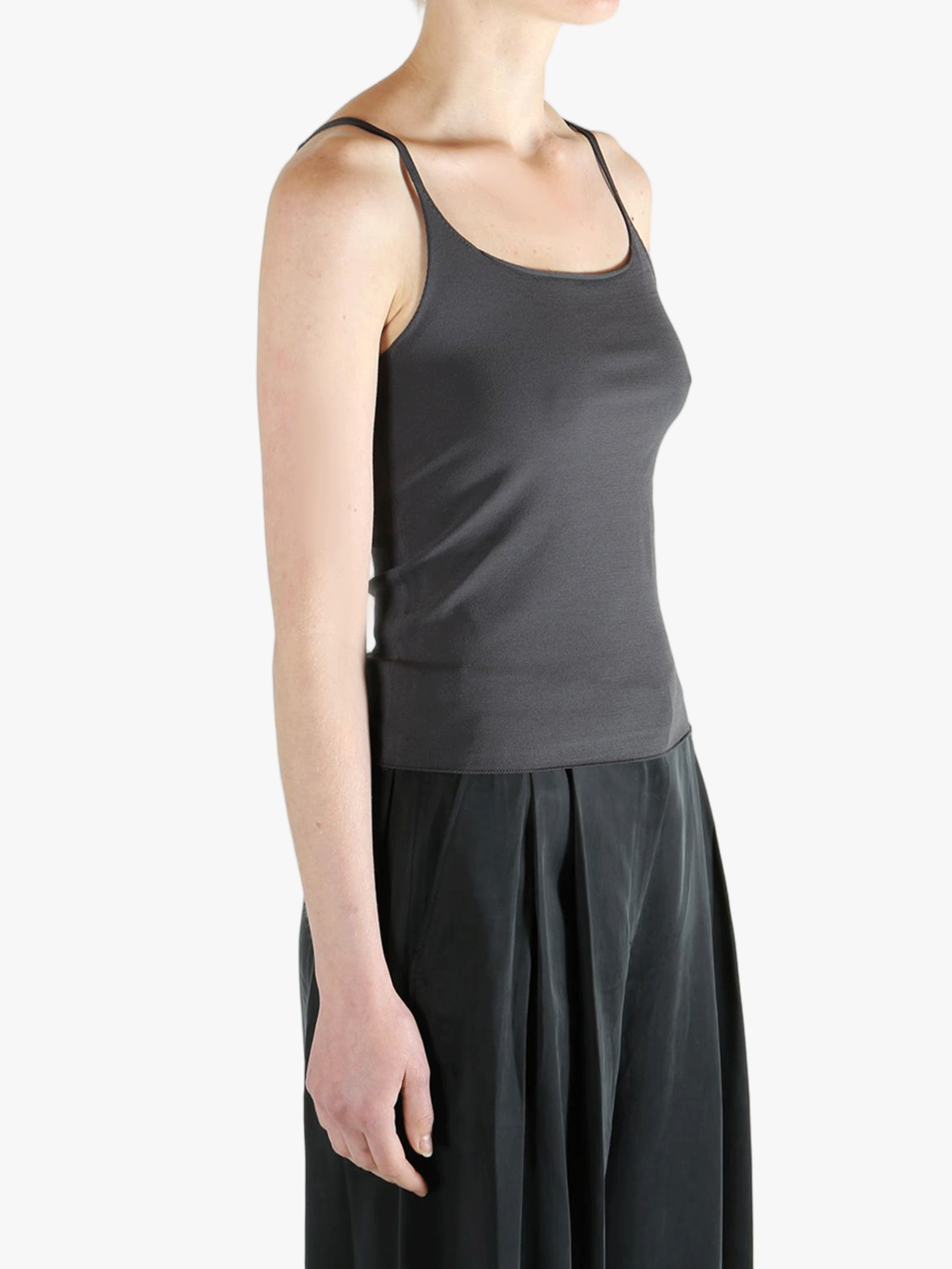 Grey top worn by a person, showing the top fit