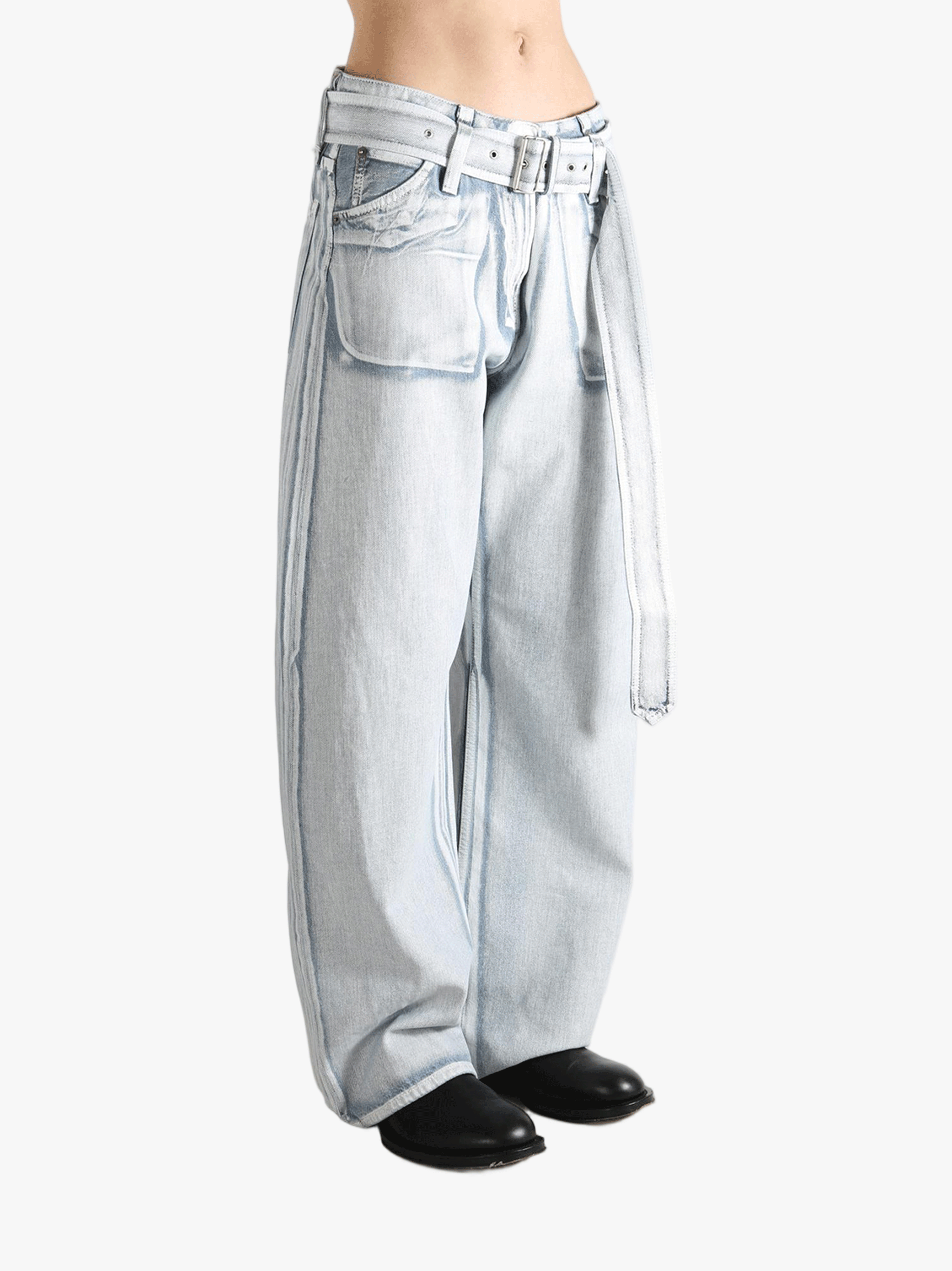 Blue jeans worn by a person, showing the jeans's fit