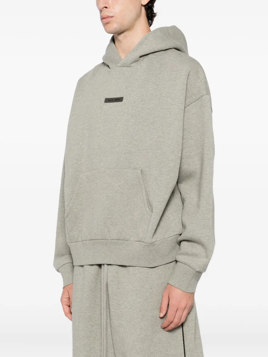 Gery hoodie worn by a person, showing the hoodie fit