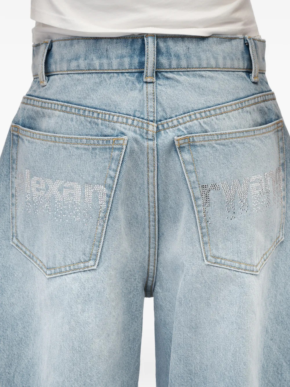 Blue pants worn by a person, showing the pants fit