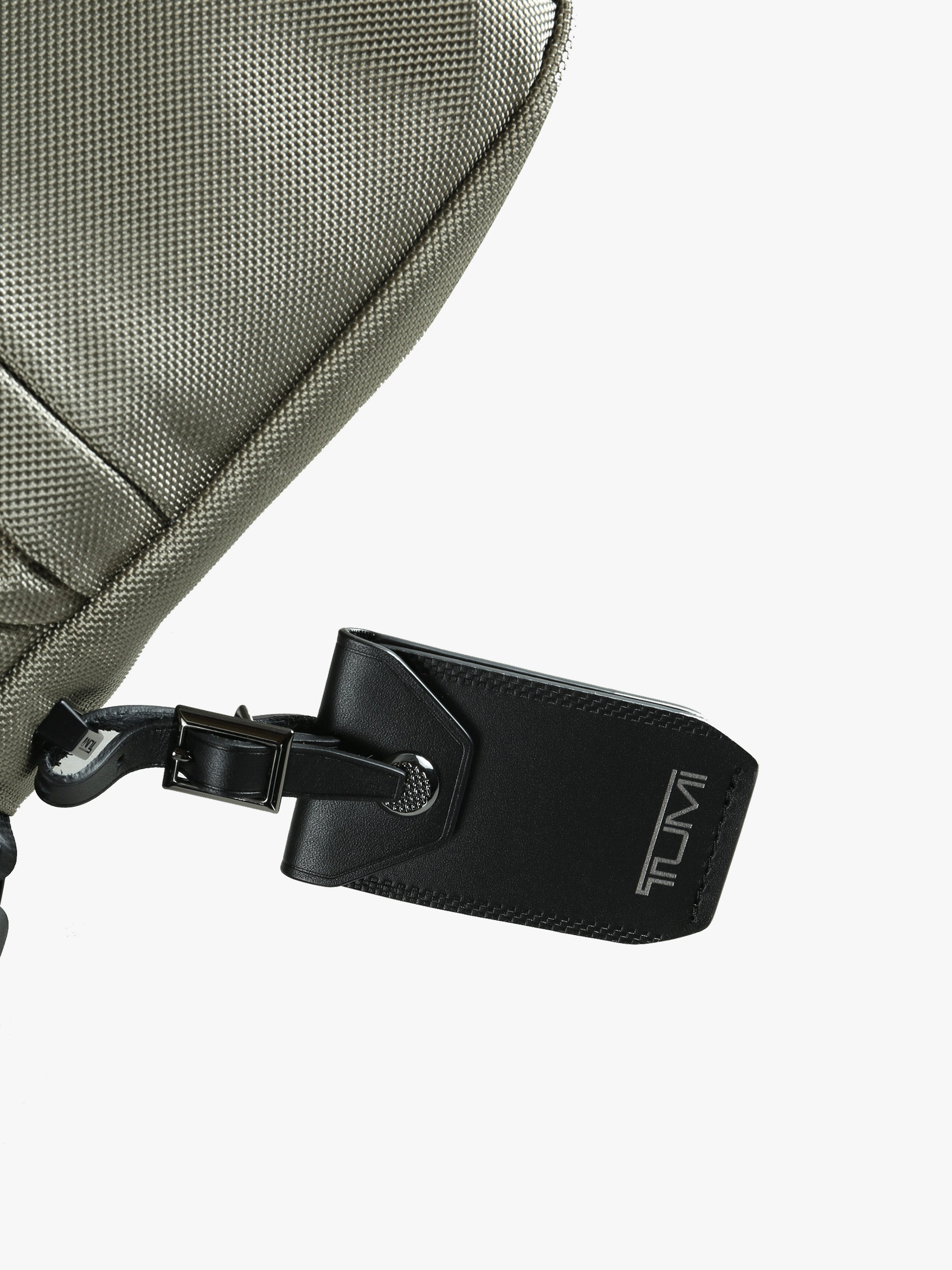 Close up of grey bag, showing texture of the nylon fabric