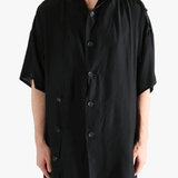 Black jacket worn by a person, showing the jacket's fit