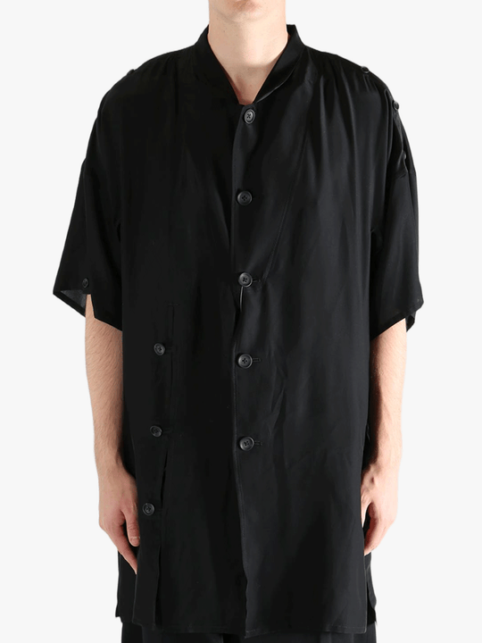 Black jacket worn by a person, showing the jacket's fit