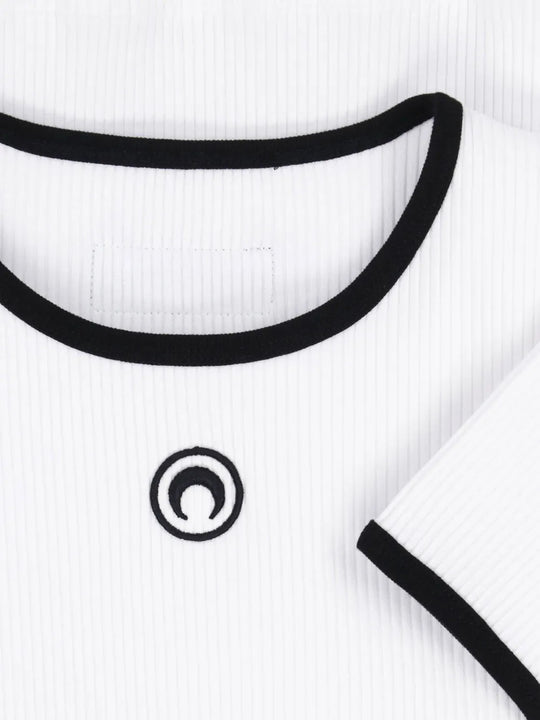 Close up of White t-shirt, showing texture of the 95% certified cotton/ 5% elastane made in fabric