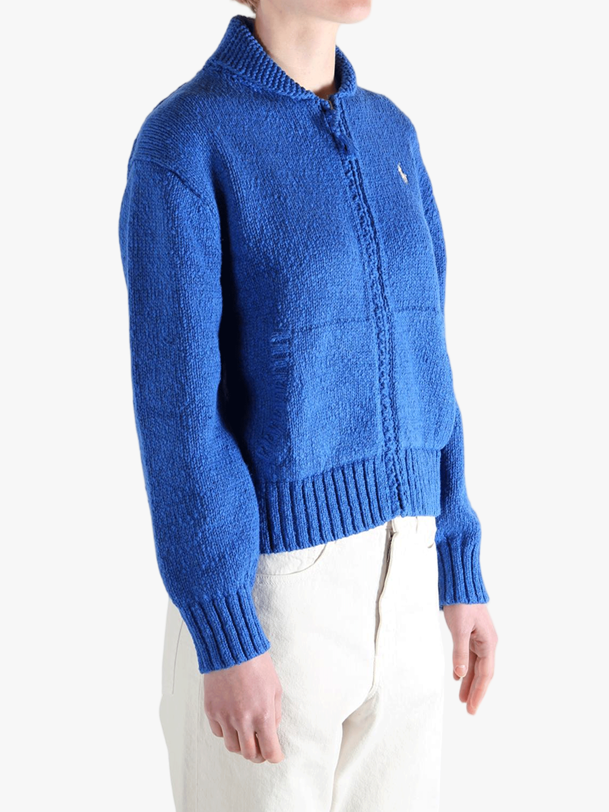 Blue sweater worn by a person, showing the sweaters fit