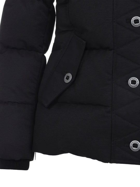 Close up of the black jacket, showing texture of the cotton and nylon fabric