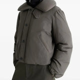 Grey coat worn by a person, showing the coat's fit