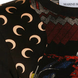 Close up of Black t-shirt, showing detail