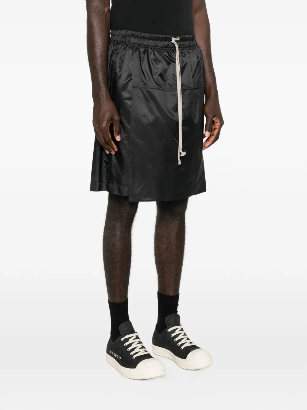 Black short worn by a person, showing the short fit