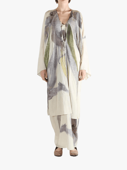 Tan top worn by a person, showing the top's fit